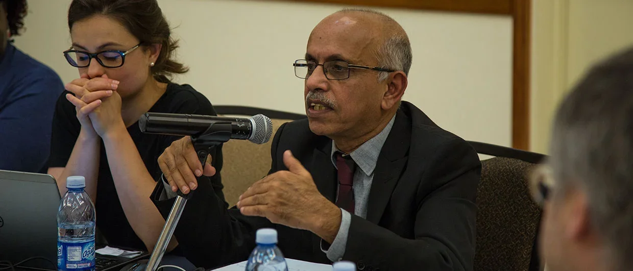 M.R. Rajagopal speaking into a microphone