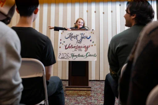 Knaul gesturing from a podium