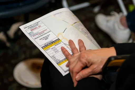 A volunteer holds a Census Sub Tract Map