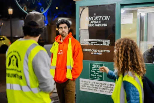 Volunteers outside of a westwood parking lot