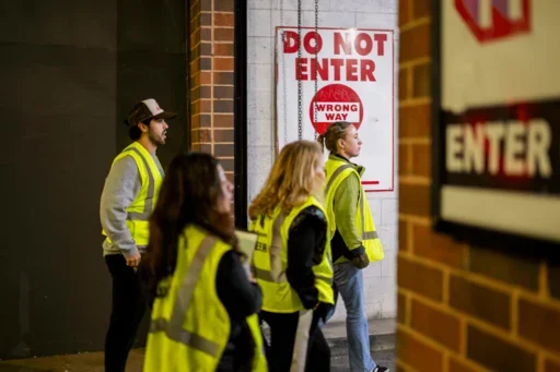 Volunteers entering a parking garage
