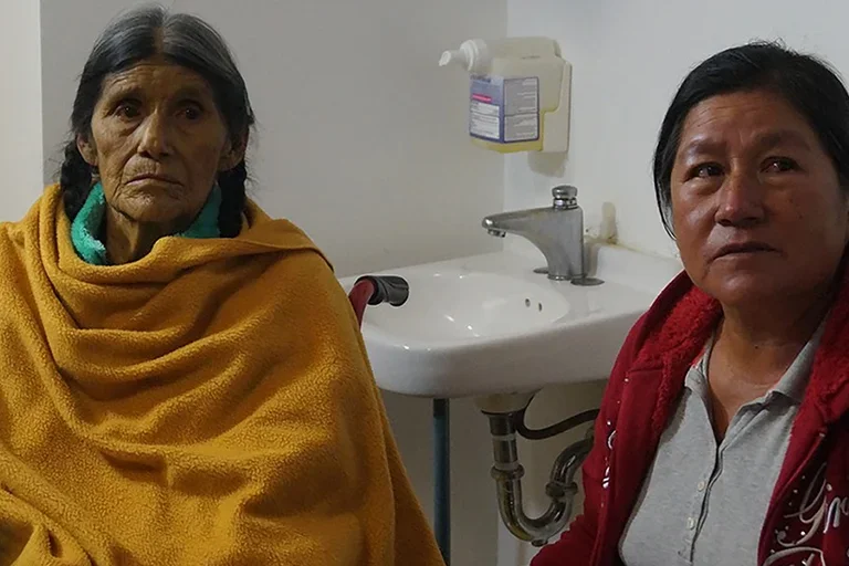 Two women in health care facility