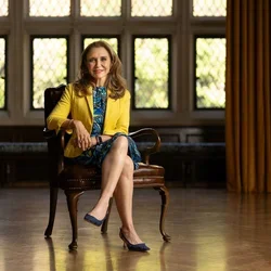 Felicia M Knaul sitting in chair