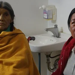 Two women in health care facility